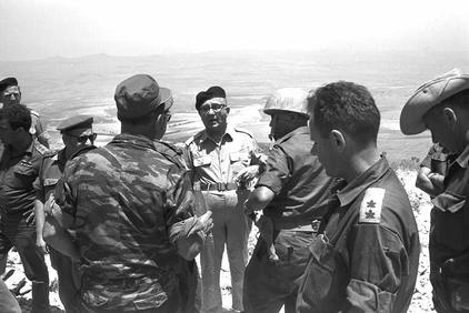 P.M. Levy Eshkol (Center) with senior staff officers during a visit to northern command headquarter. -GPO 6/10/1967