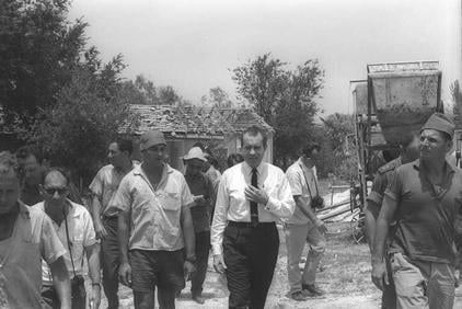 Richard Nixon (Center) visiting Kibbutz Gadot which was under Syrian shell fire until the outbreak of the Six Day War. -GPO 6/24/1967