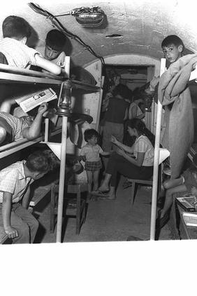 Children in one of the shelters at Kibbutz Gadot during an attack by Syrian shell fire on the kibbutz. -GPO 4/1/1967