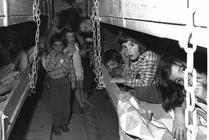 Children in one of the shelters at Kibbutz Gadot during an attack by Syrian shell fire on the Kibbutz. -GPO 4/1/1967